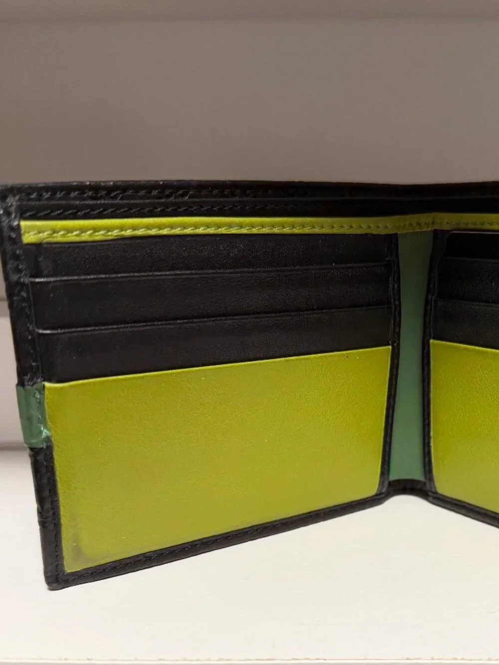 Gucci Guccissima Leather Bi Fold Wallet  Men's